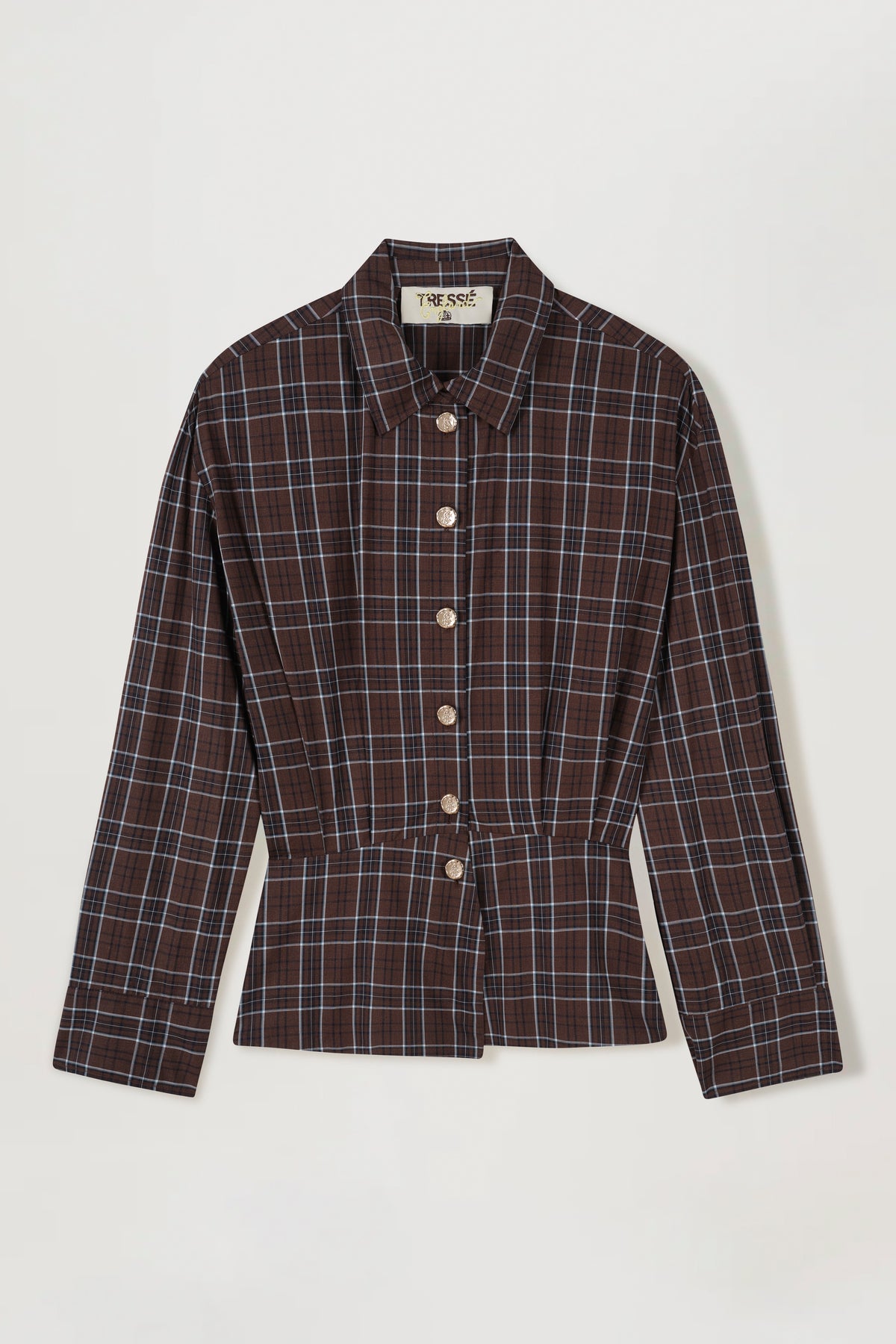 Chemise à carreaux et boutons dorés