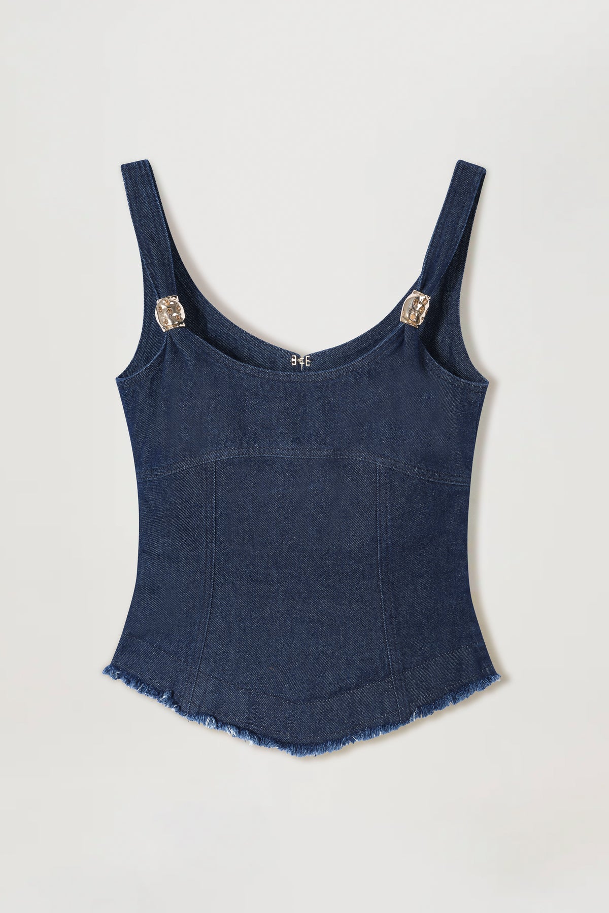 Top en denim con apliques dorados