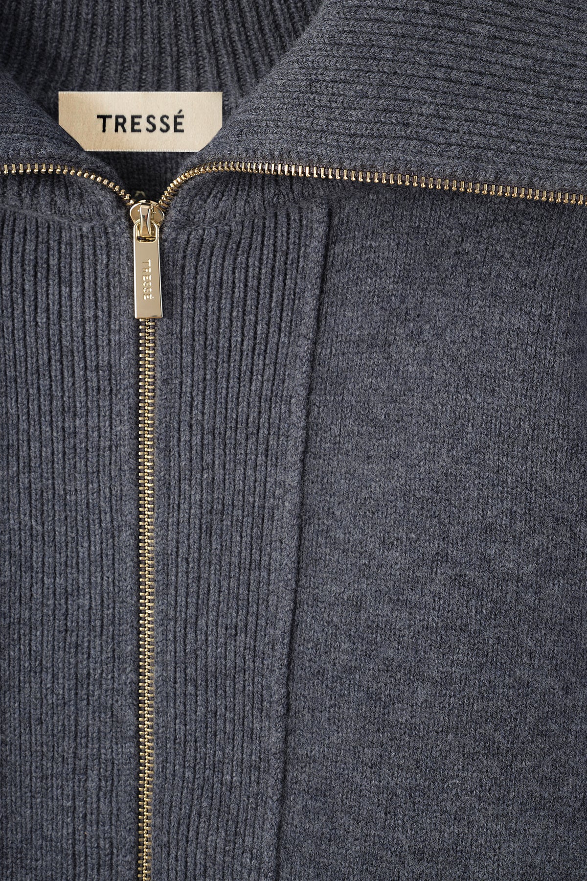 Cardigan with gold zip fastening