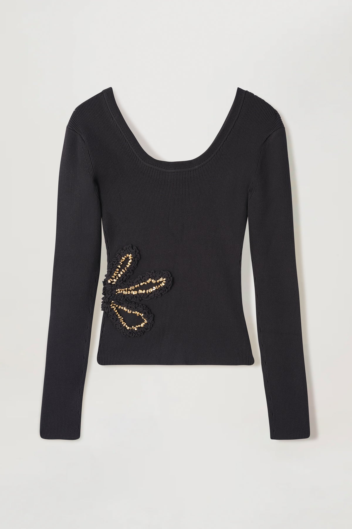 Knit top with flowers embellished with gold jewelry