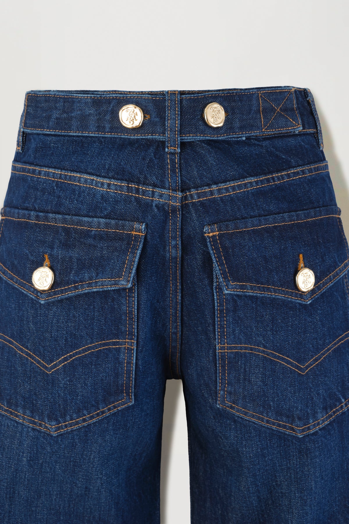 Raw denim jeans with flap waistband