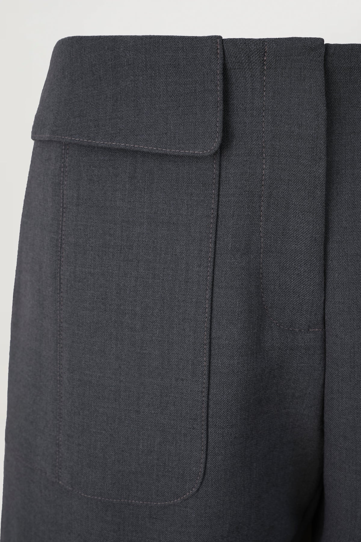 Tailored trousers with patch pockets