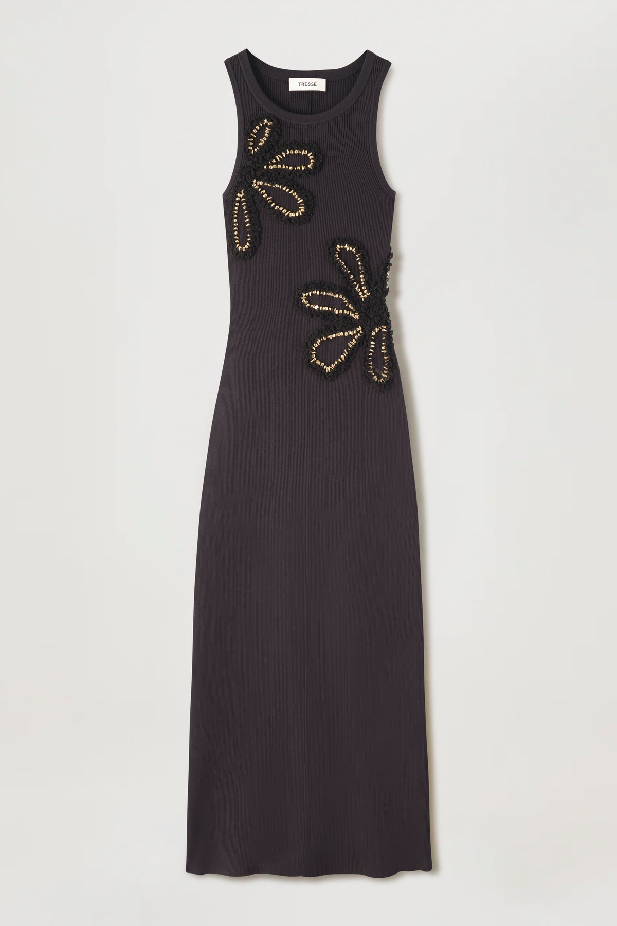 Dress with flowers embellished with gold jewelry