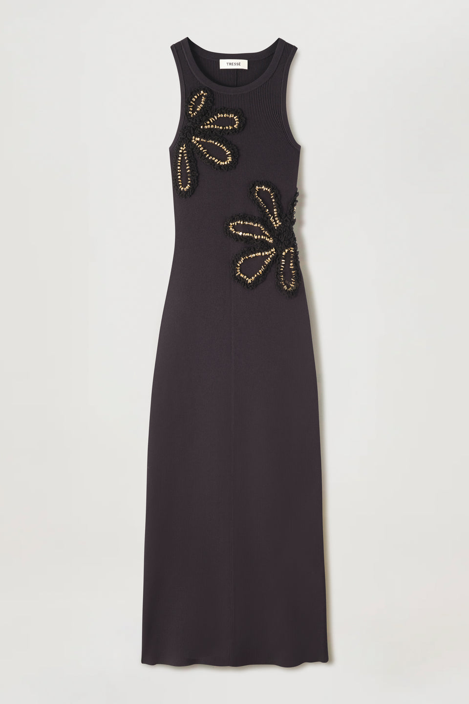 Dress with flowers embellished with gold jewelry