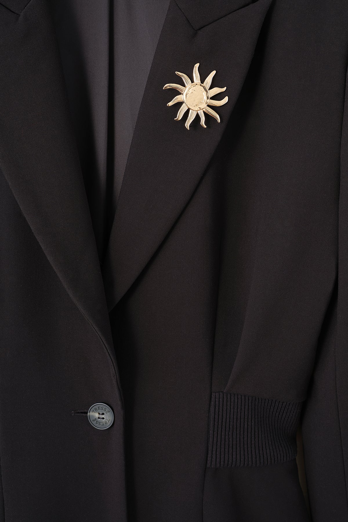 Veste tailleur avec bord-côte à la taille