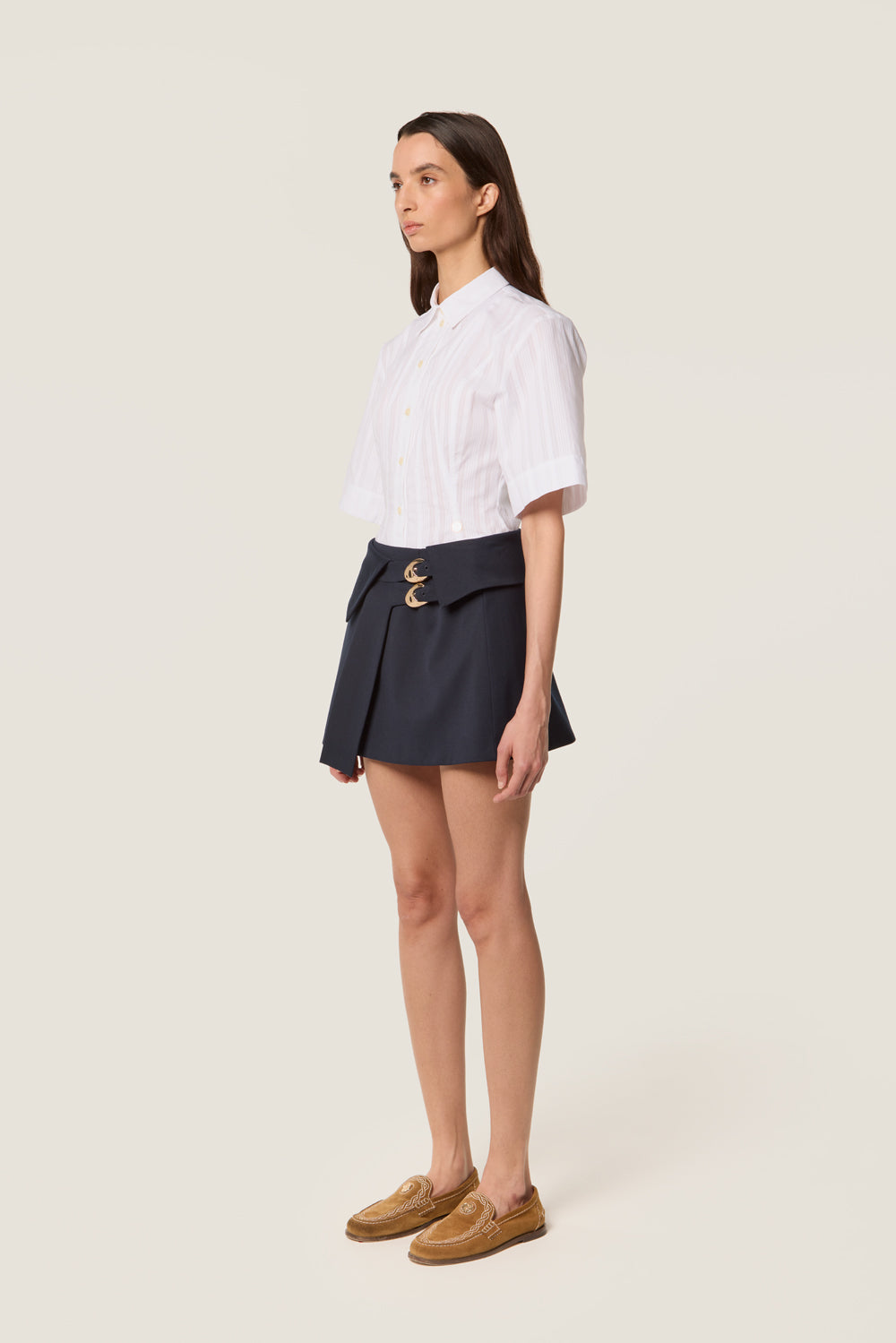 Short pleated skirt with loops