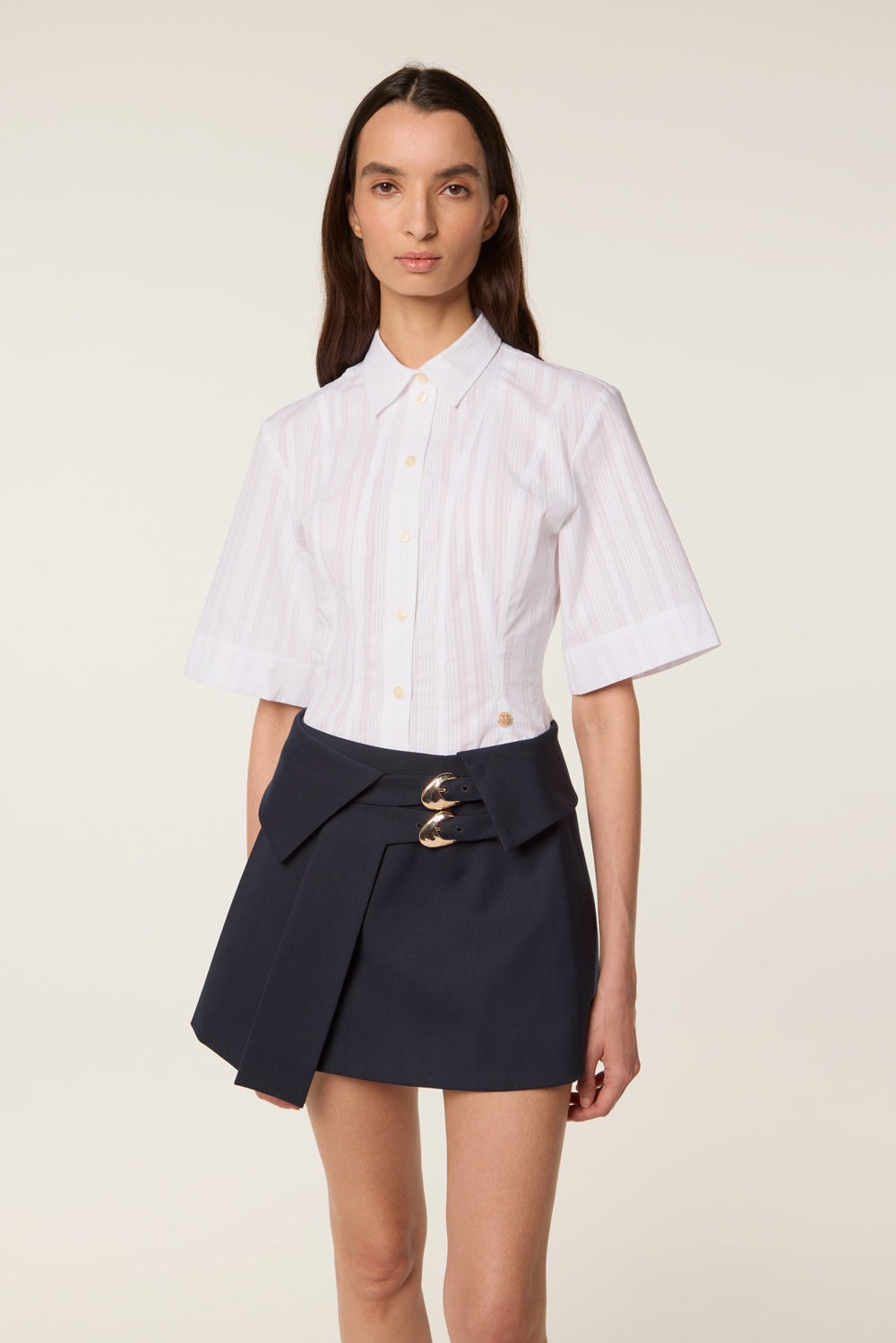 Short pleated skirt with loops