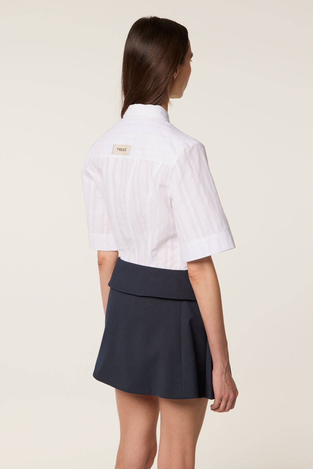 Short pleated skirt with loops