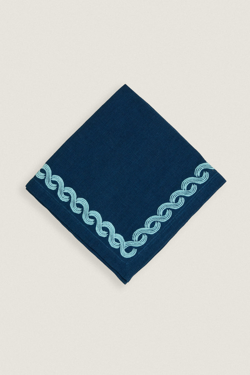 Embroidered braid napkin