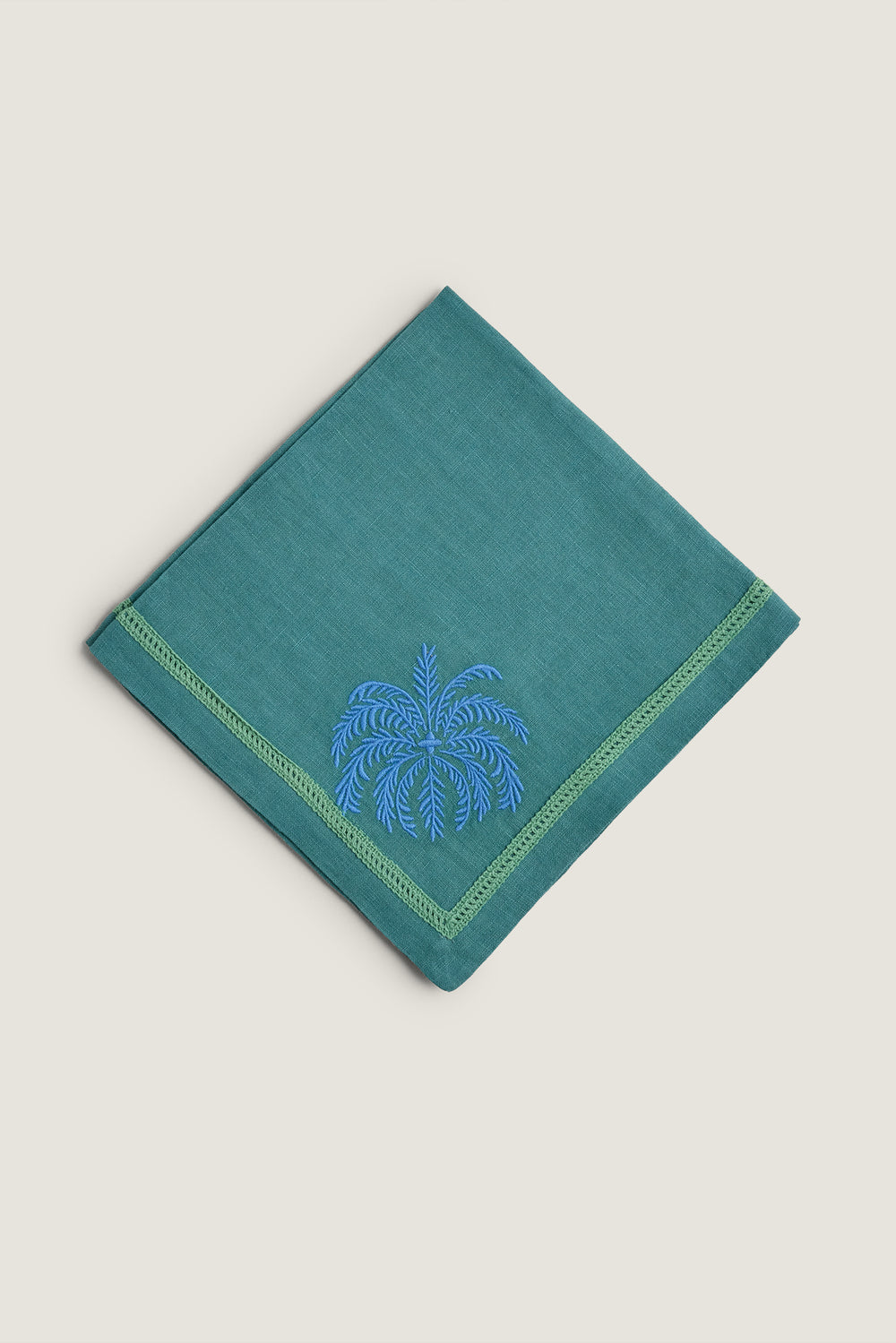 Embroidered palm tree napkin