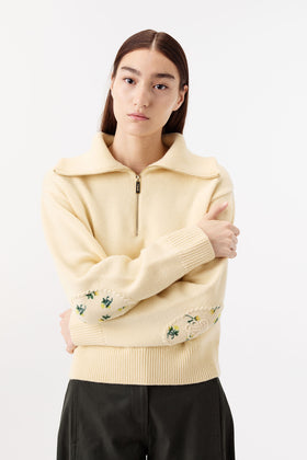 Sweater with floral elbow patches
