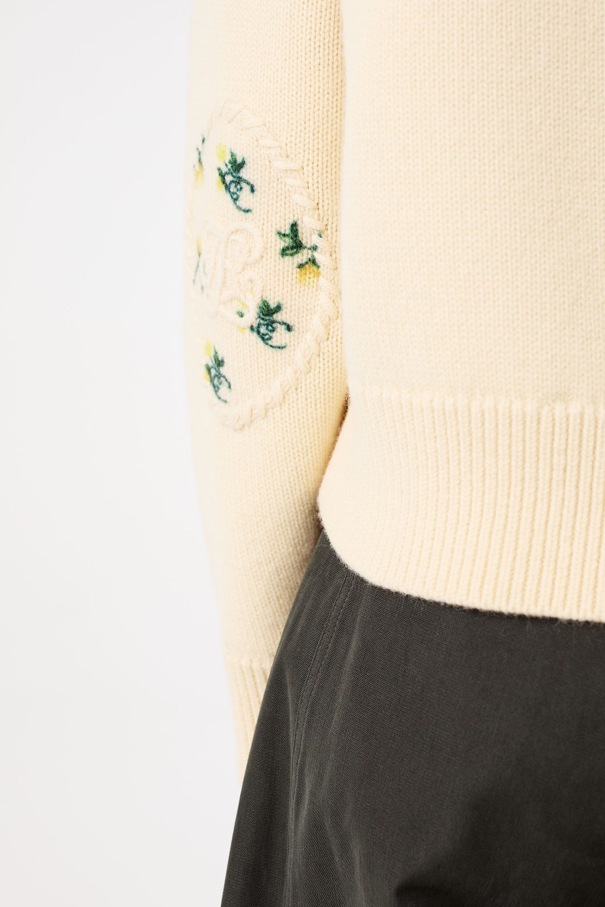 Sweater with floral elbow patches