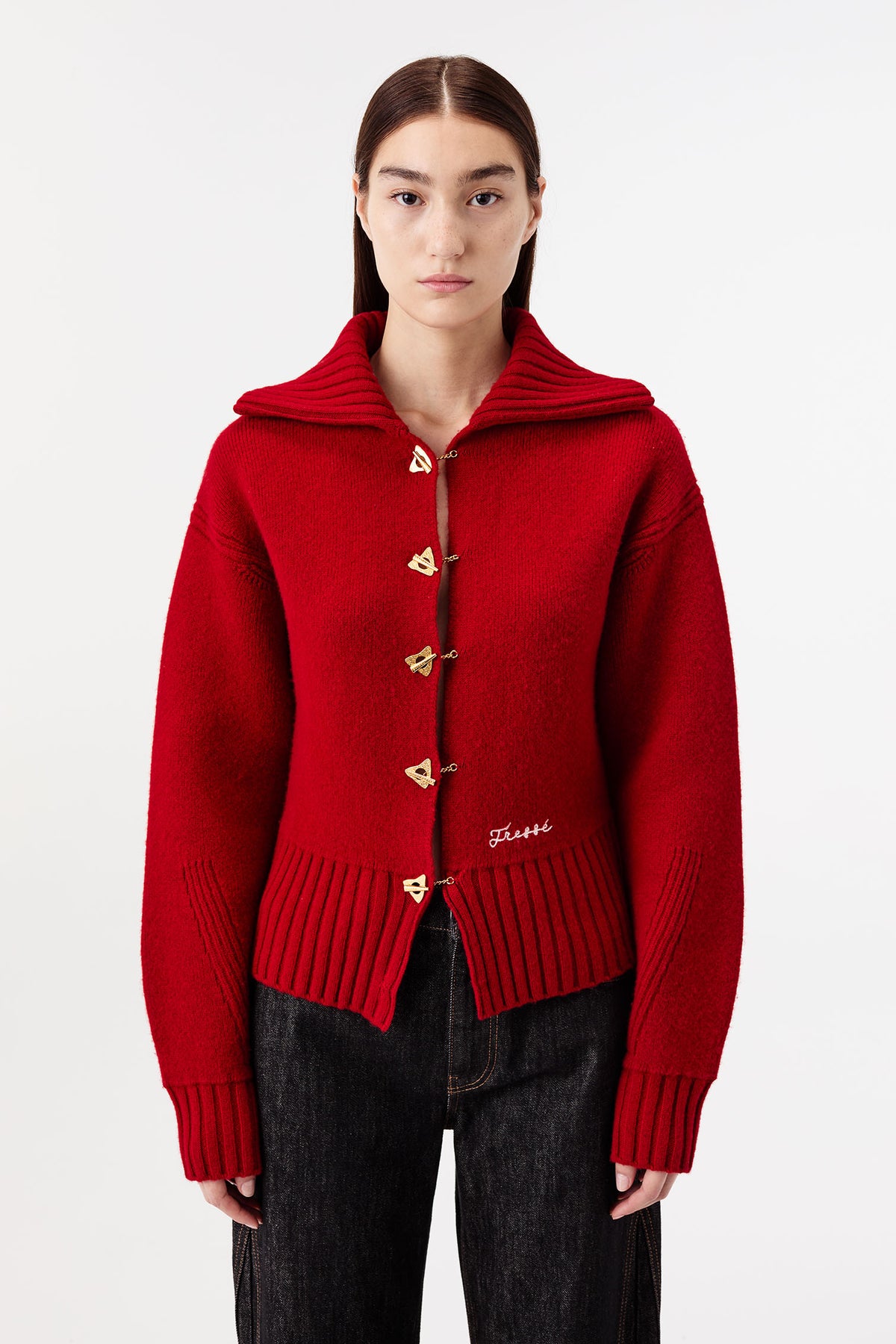 Cardigan with chain button fastening