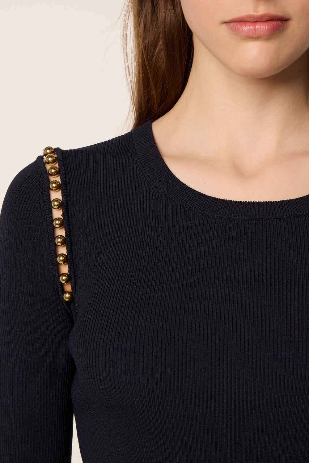 Sweater with golden beads