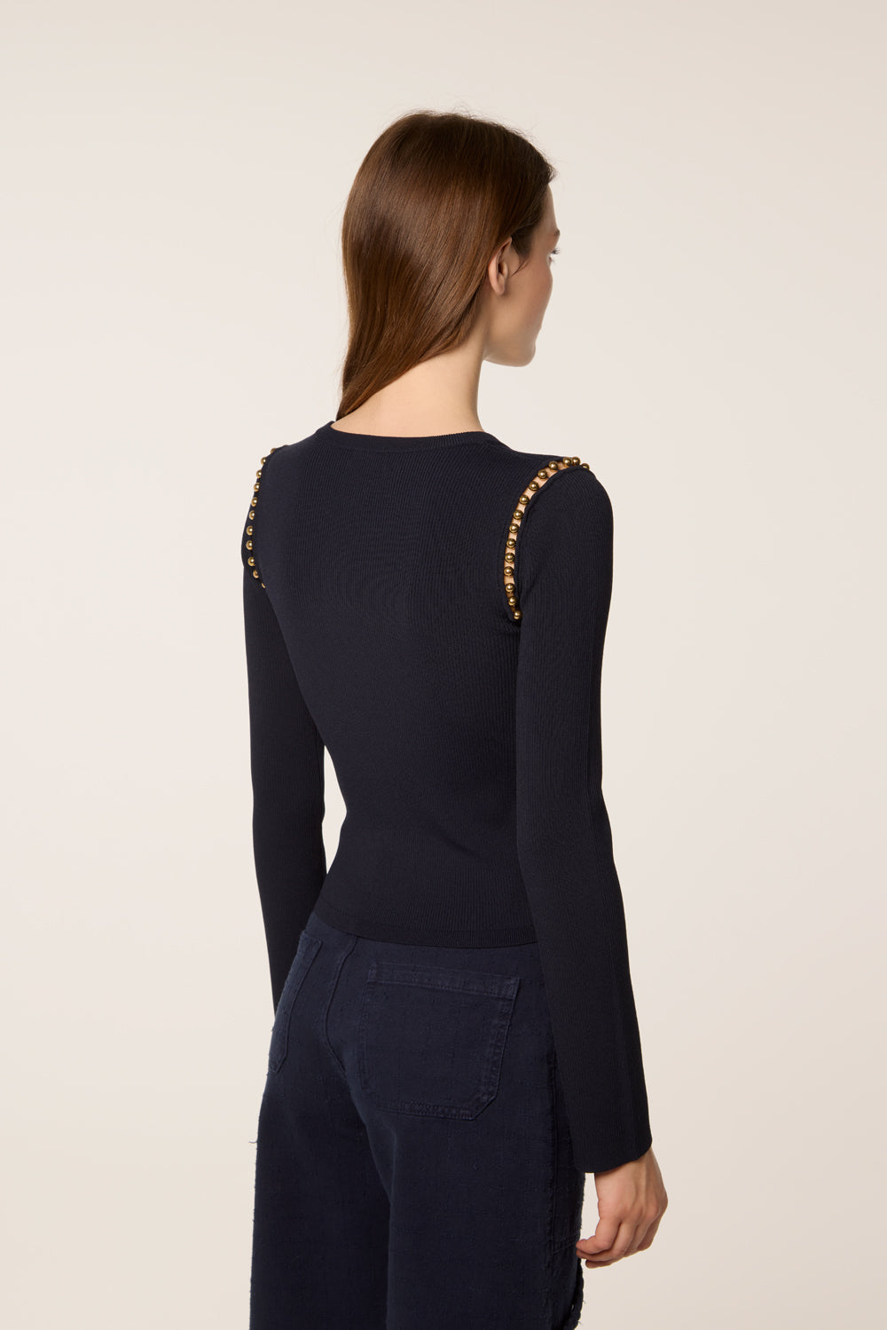 Sweater with golden beads