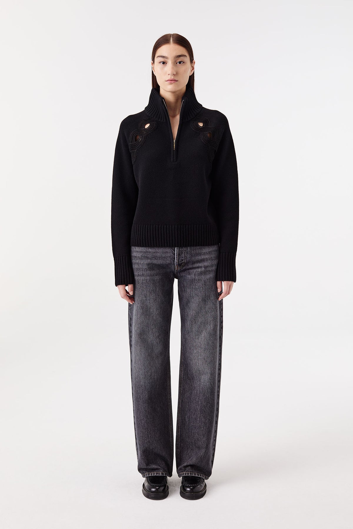 Sweater with braided opening