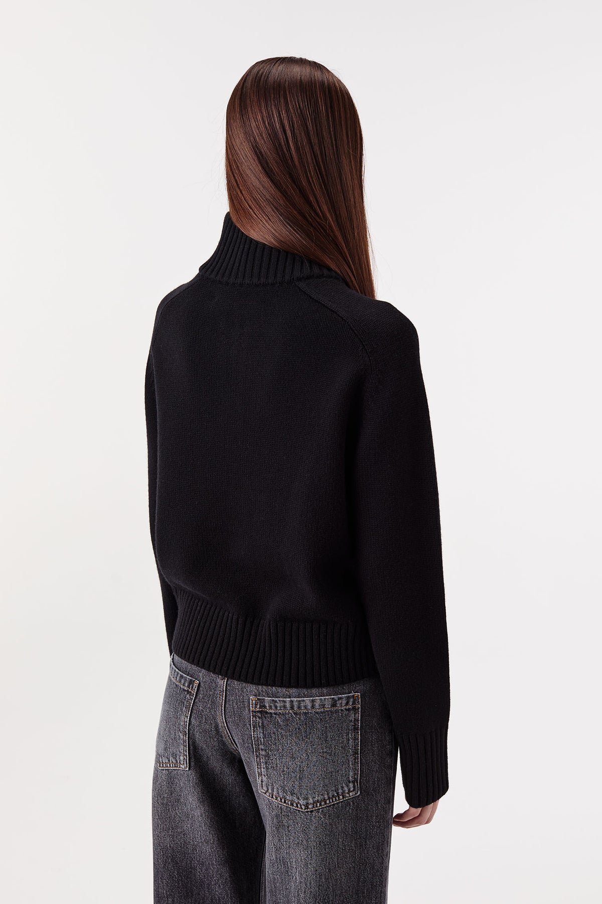 Sweater with braided opening