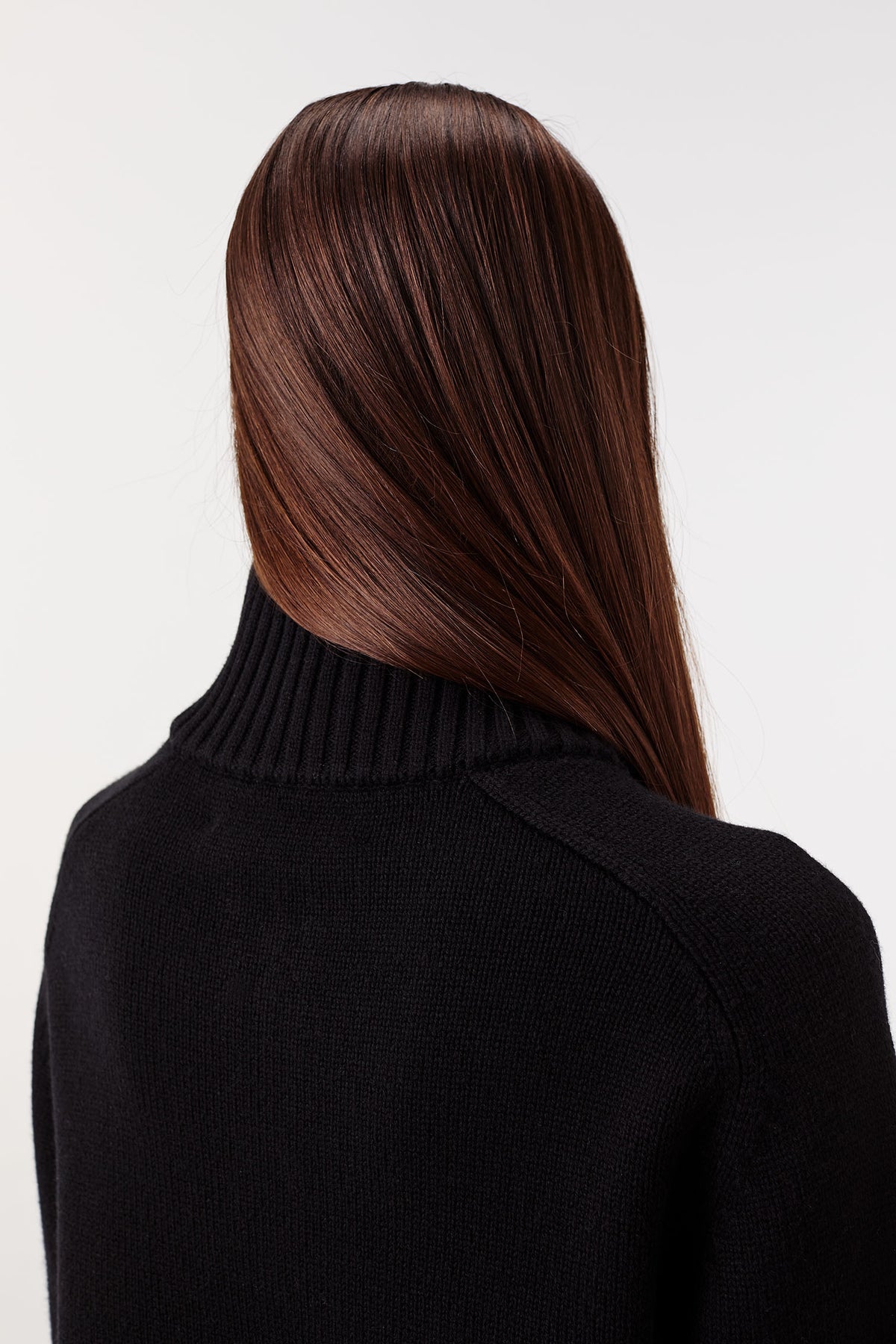 Sweater with braided opening