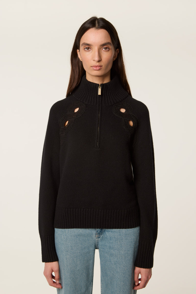 Braided opening sweater