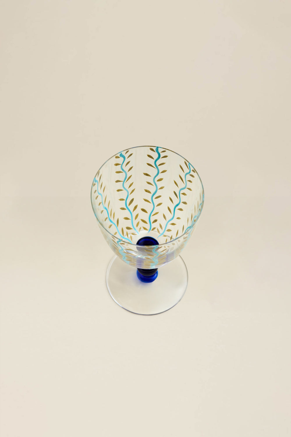 Turquoise hand painted glass with flower pattern