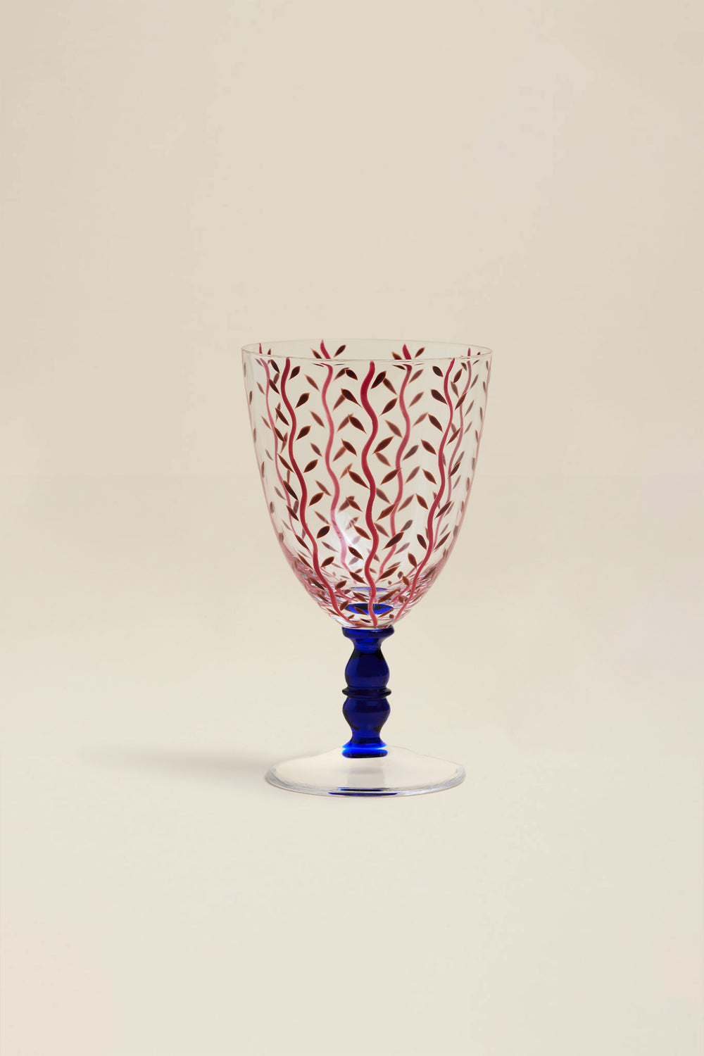 Verre à pied rouge motif fleurs