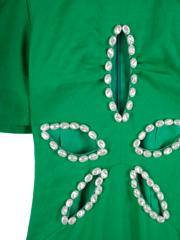Dress with flower-shaped opening