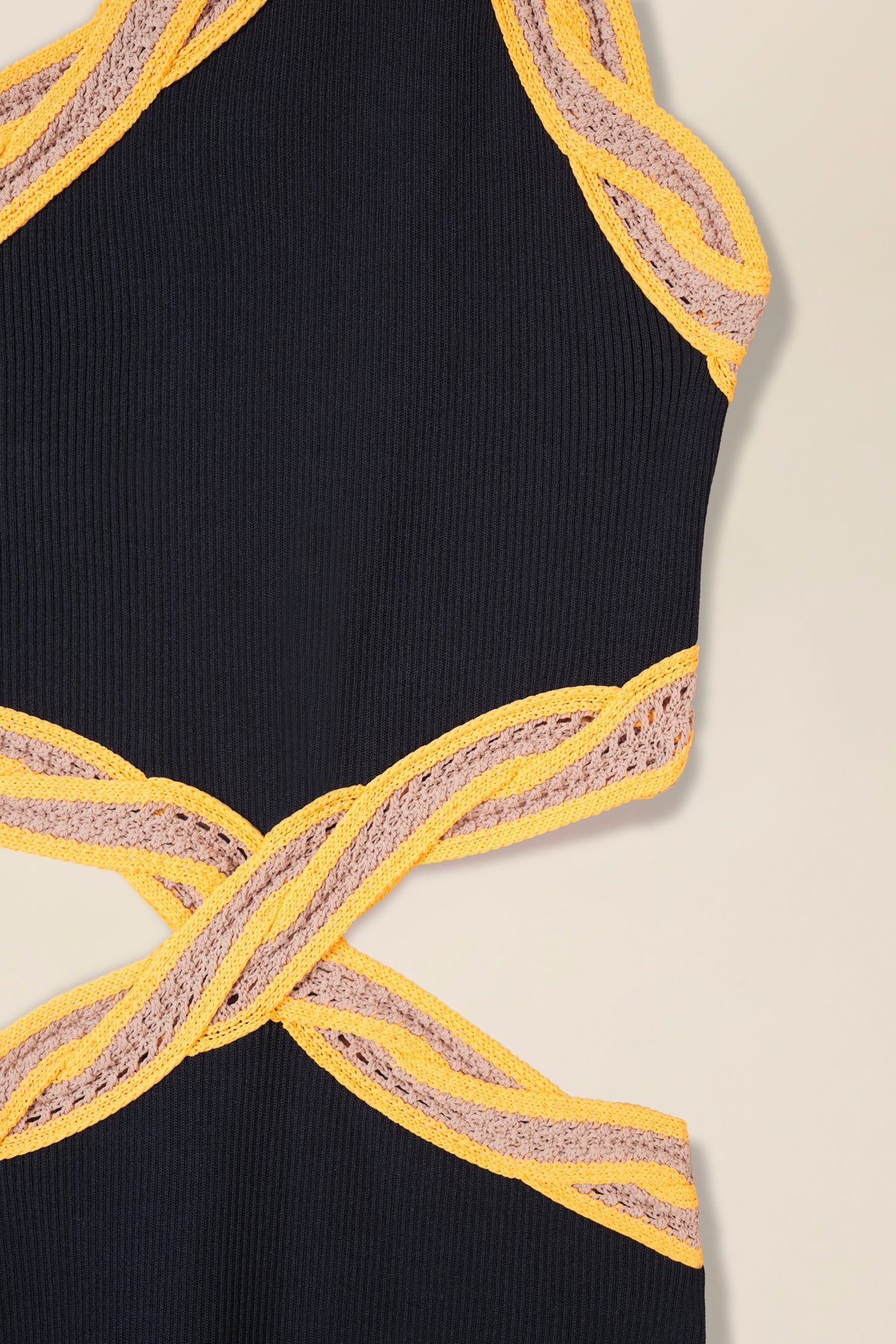 Knit dress with crocheted braid