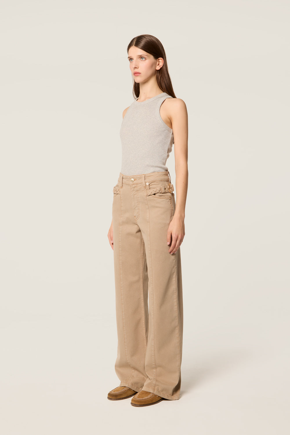 Trousers with center-leg seam
