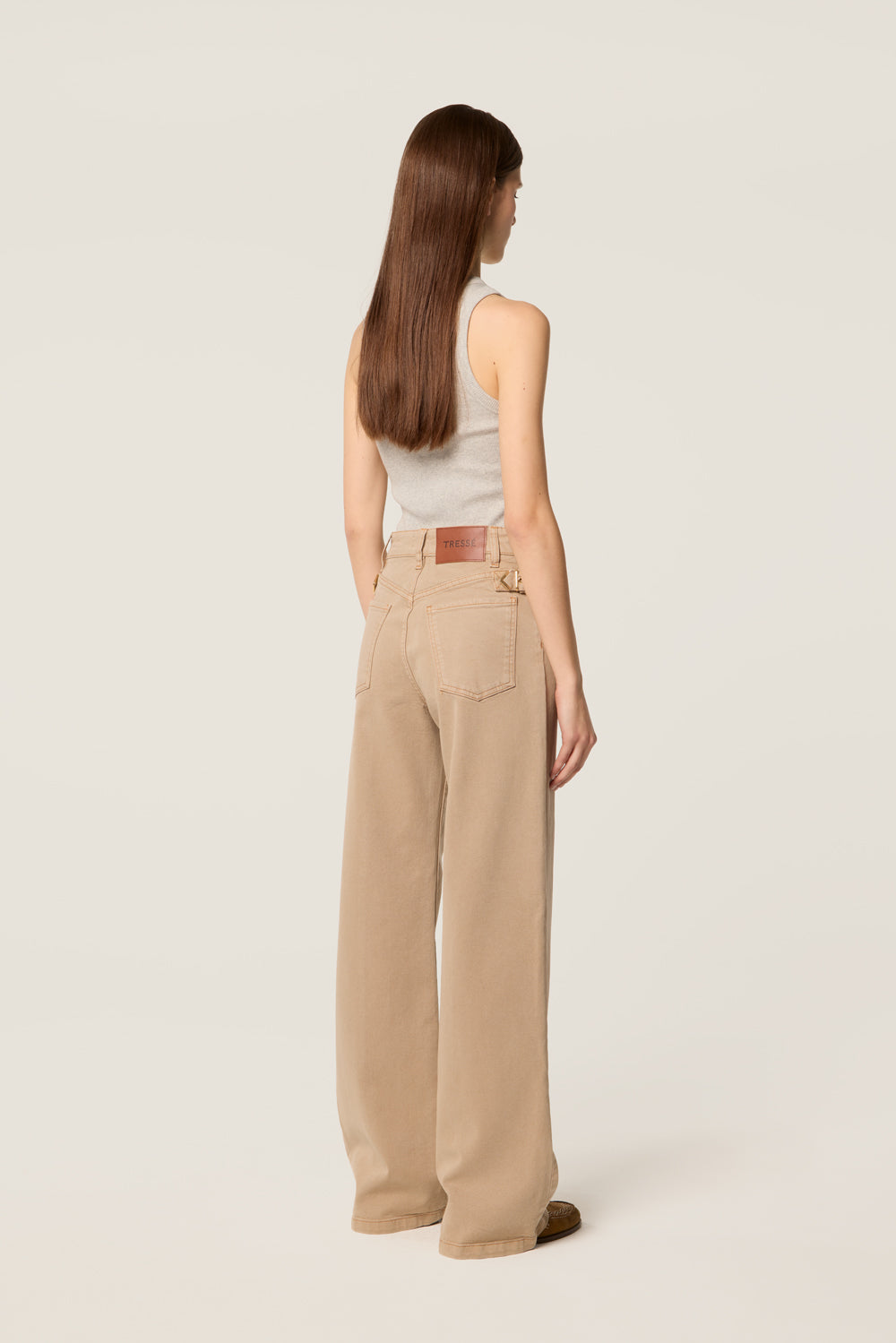 Trousers with center-leg seam