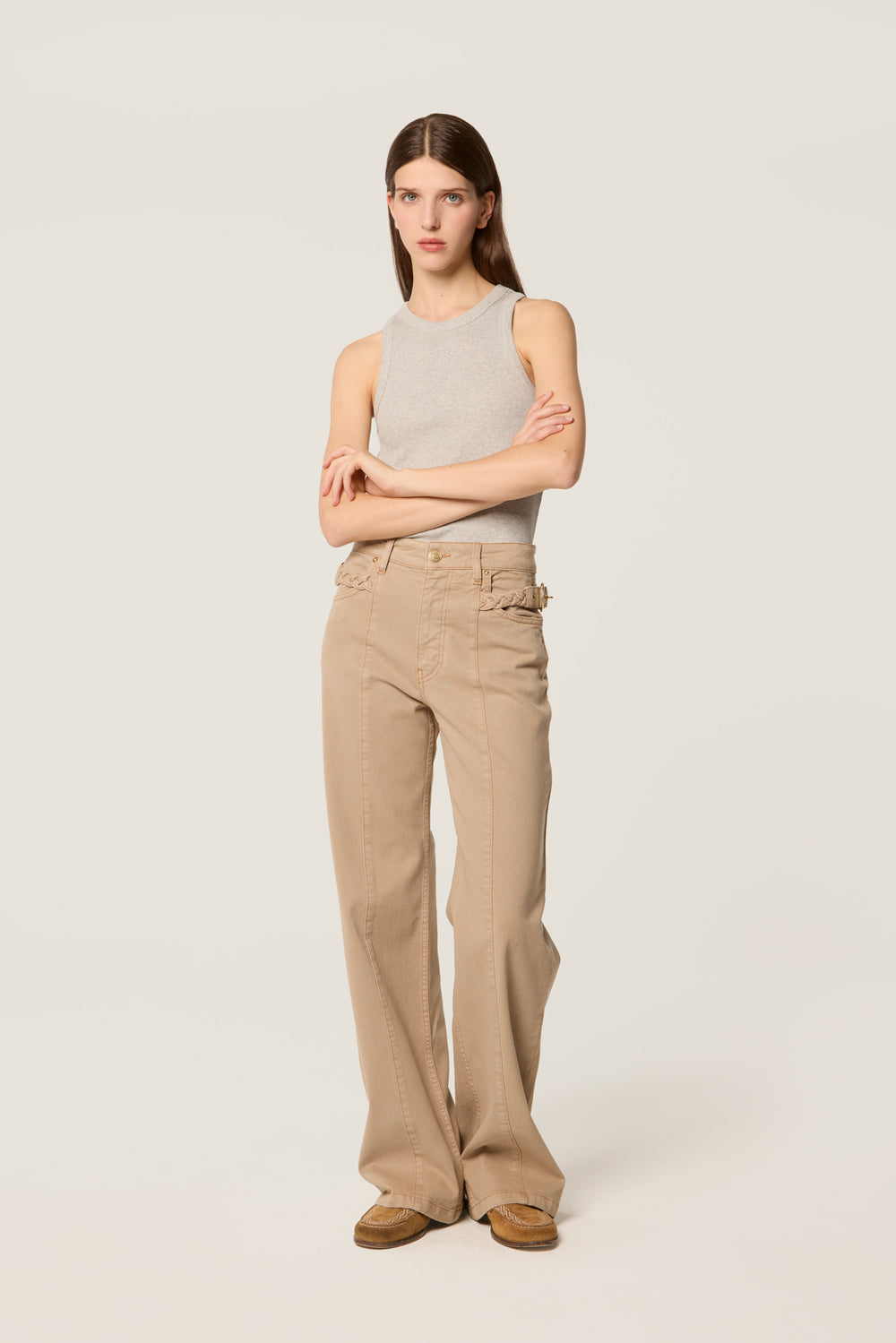 Trousers with center-leg seam