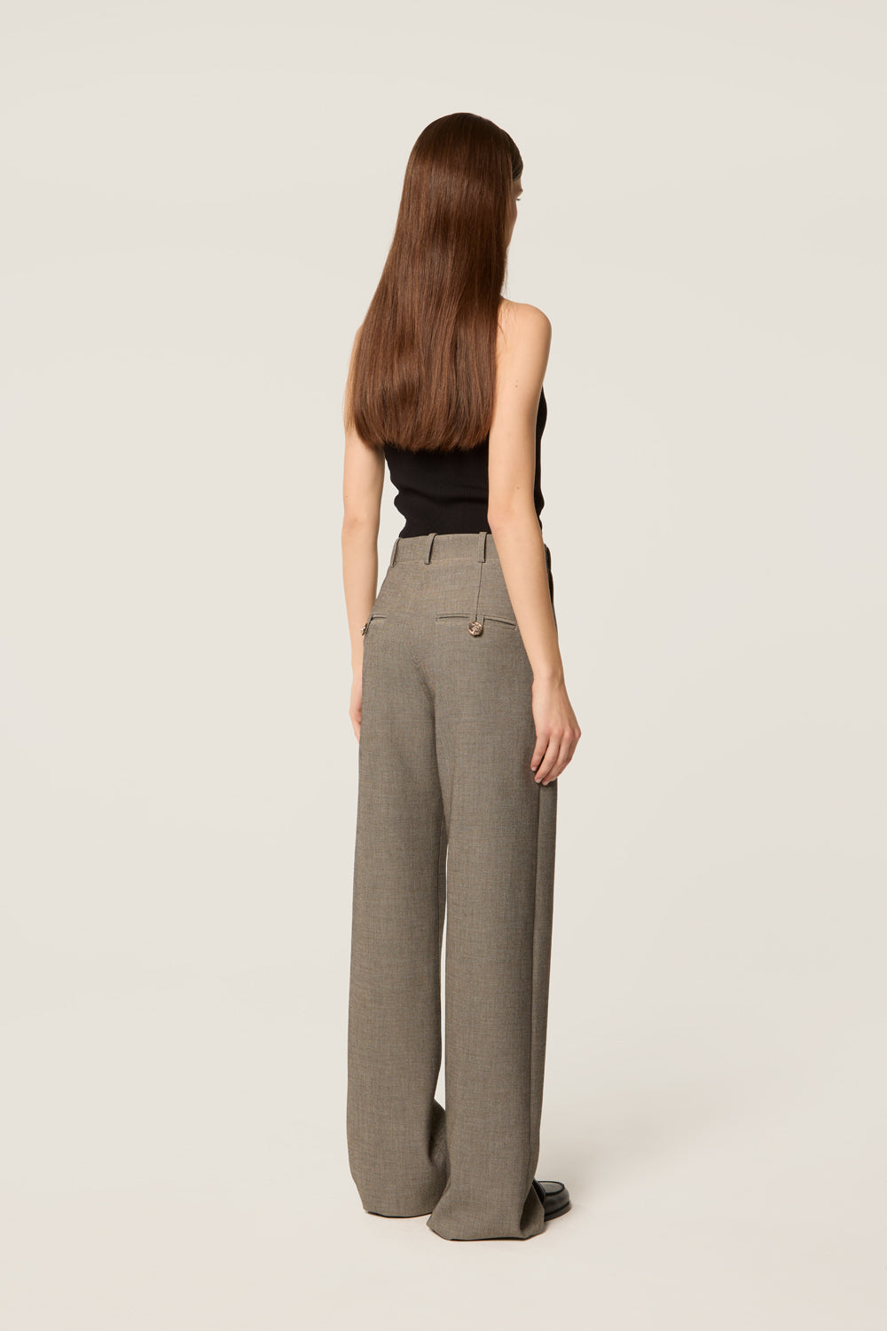Pantalon tailleur à poches plaquées
