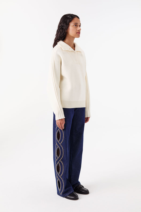 Raw denim with braided rhinestone-embellished opening