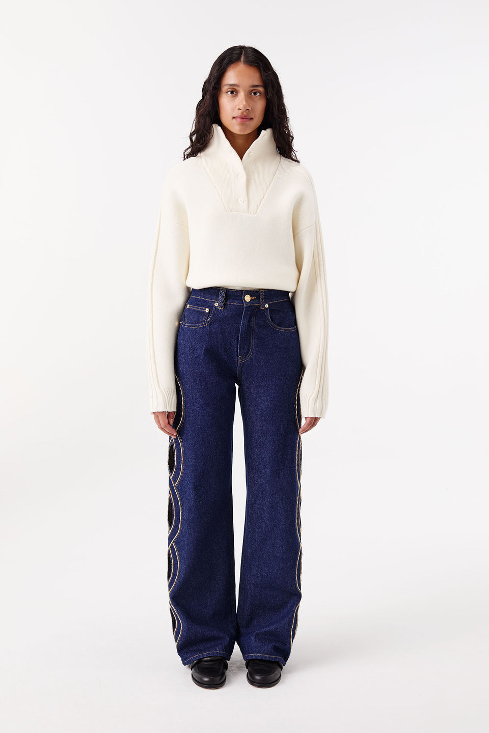 Raw denim with rhinestone-embellished braided cut-out