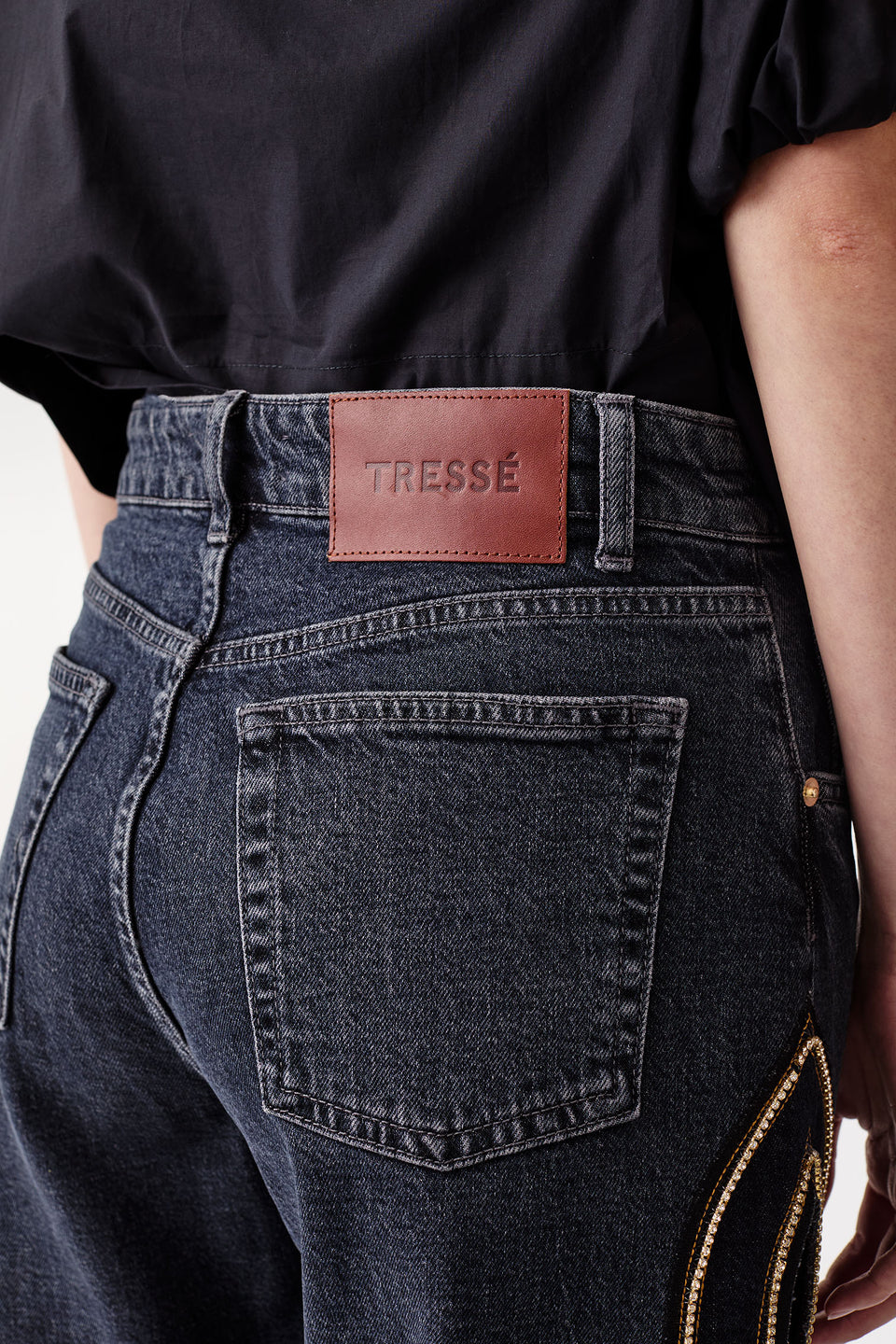 Denim with rhinestone braid