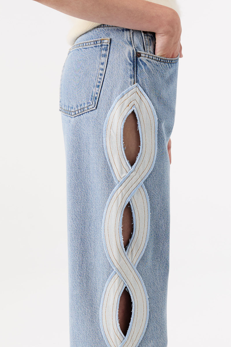 Denim clair avec ouverture tresse