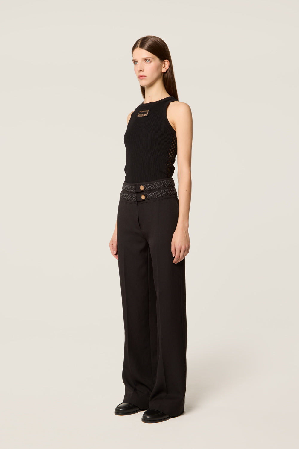 Pantalon avec ceinture tresse