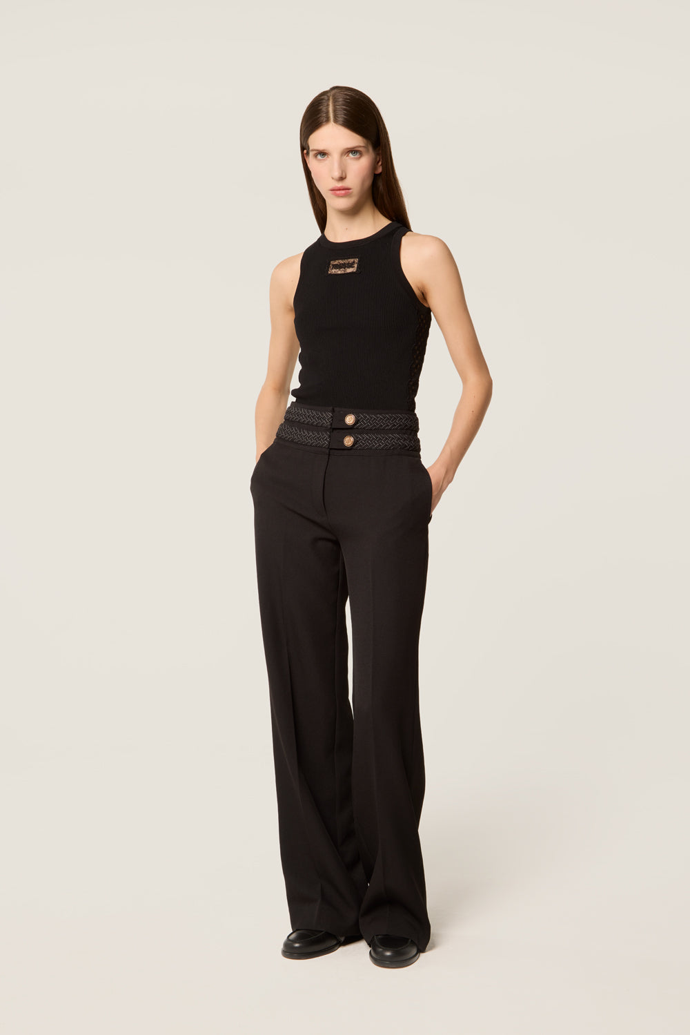 Pantalon avec ceinture tresse