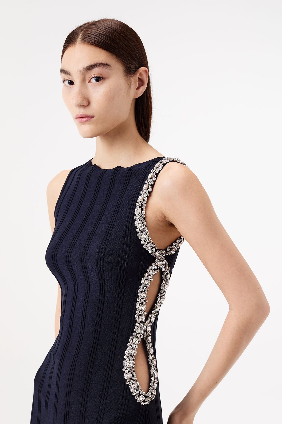 Knit dress with rhinestone-embellished opening