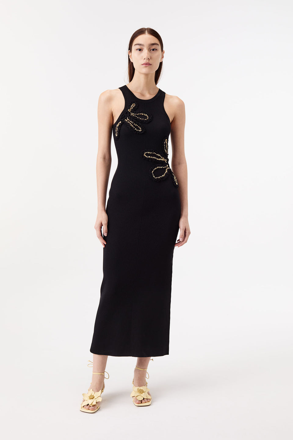 Dress with flowers embellished with gold jewelry