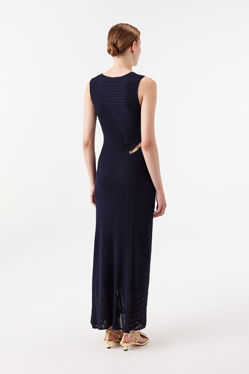 Long knit dress with gold jewelry accents