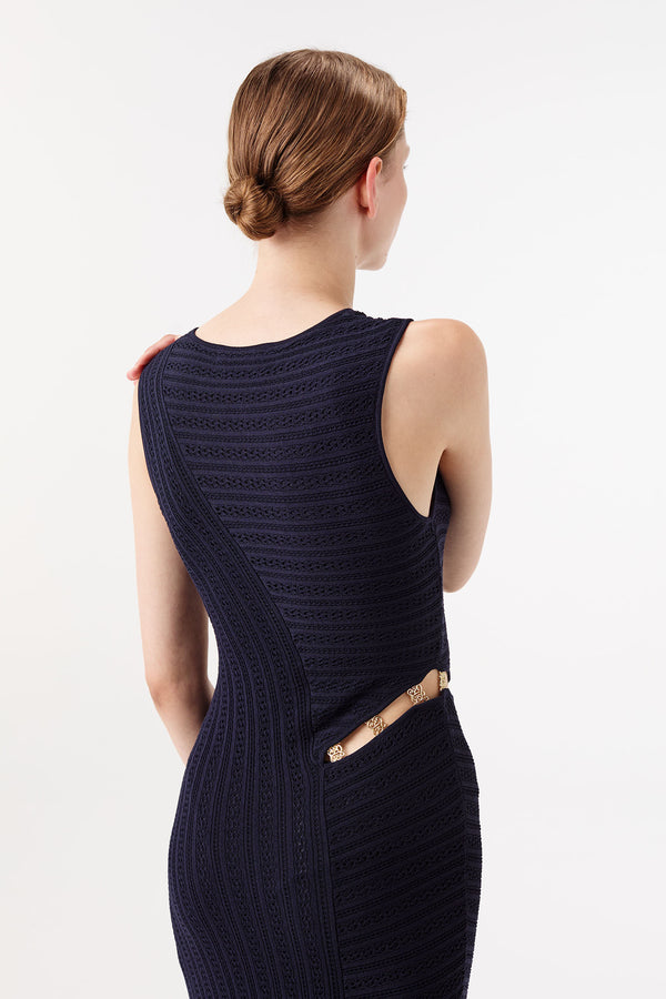 Long knit dress with gold jewelry accents
