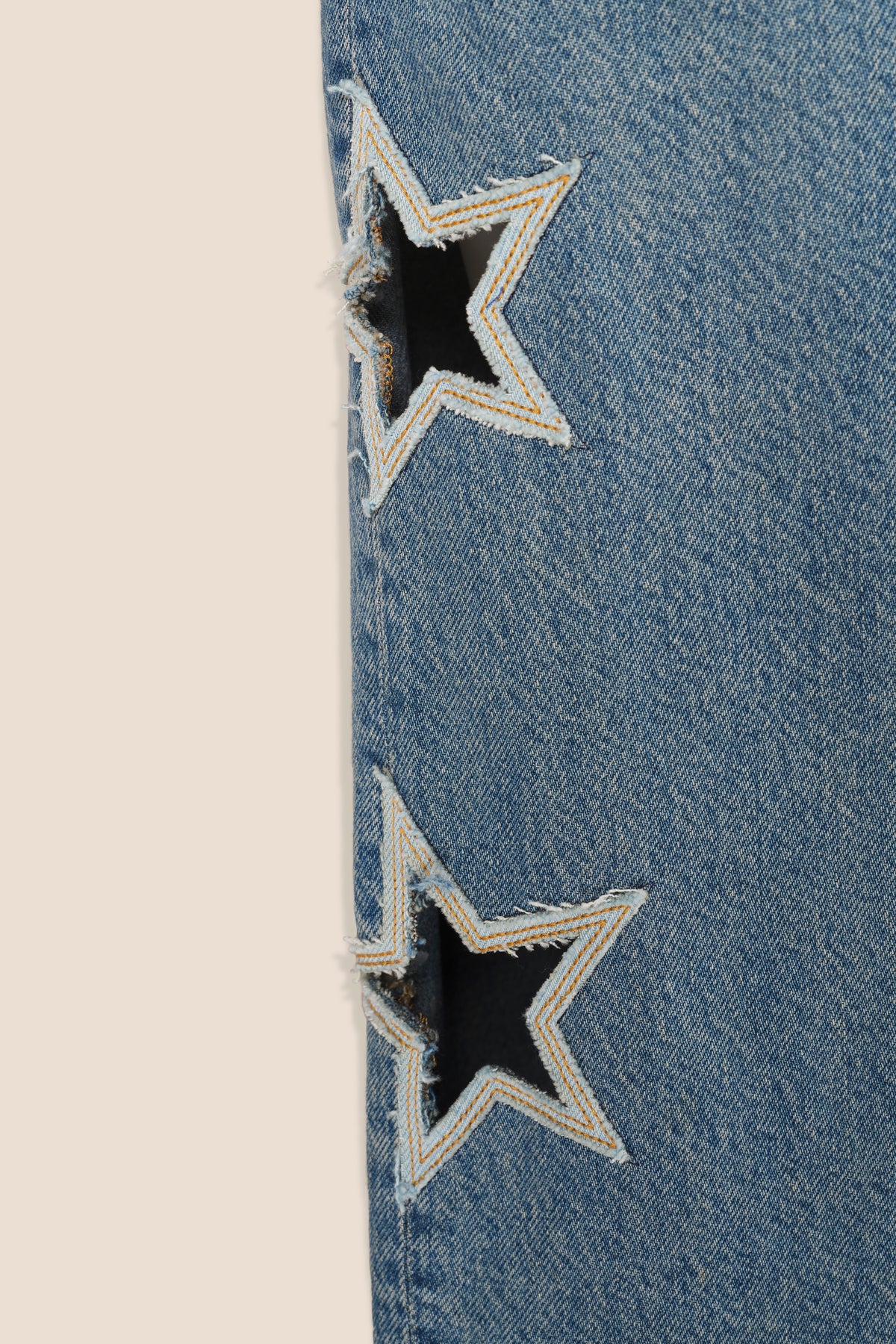 Denim con aperture a stella