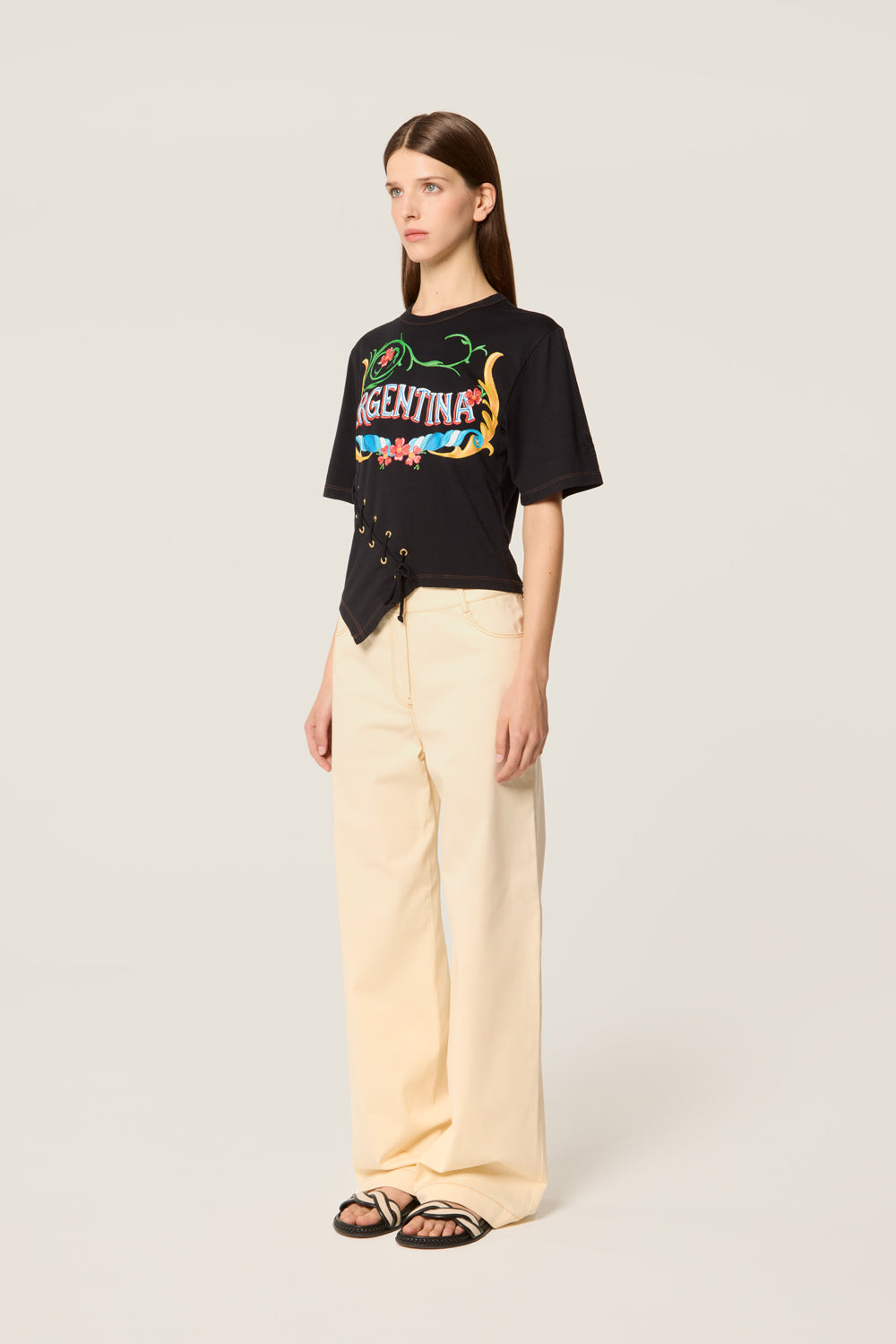 Ecru trousers with buttoned belt