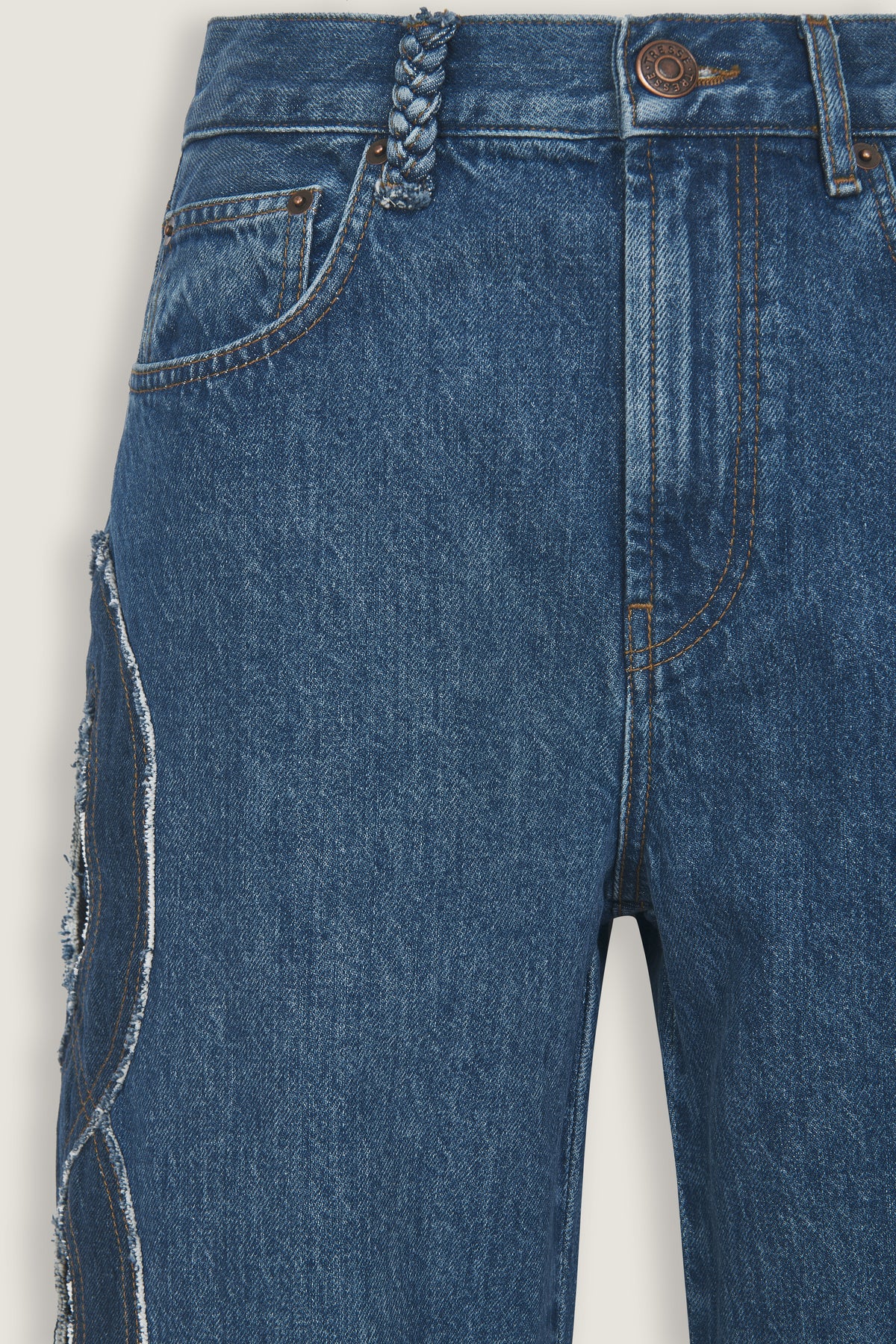 Denim avec ouverture tresse