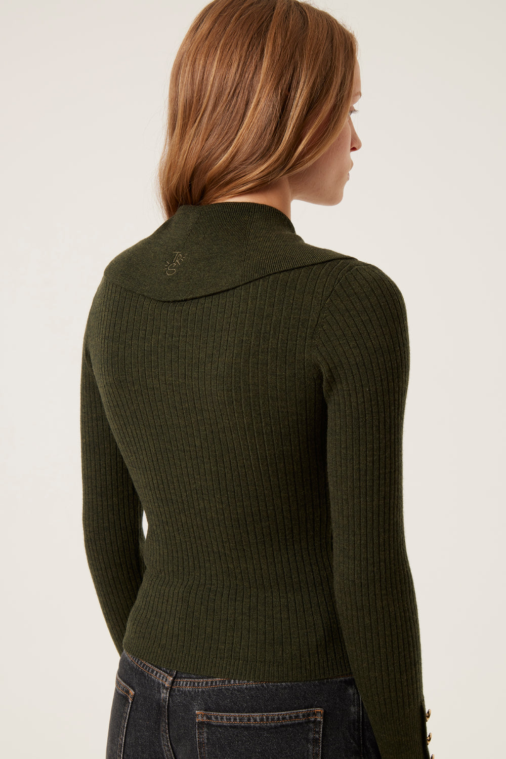 Asymmetrical opening sweater