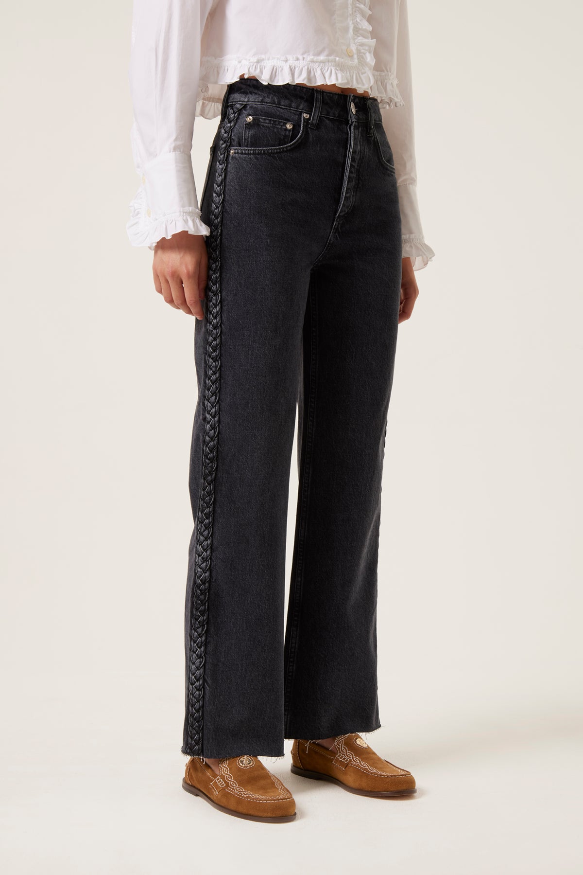 Denim with applied braids