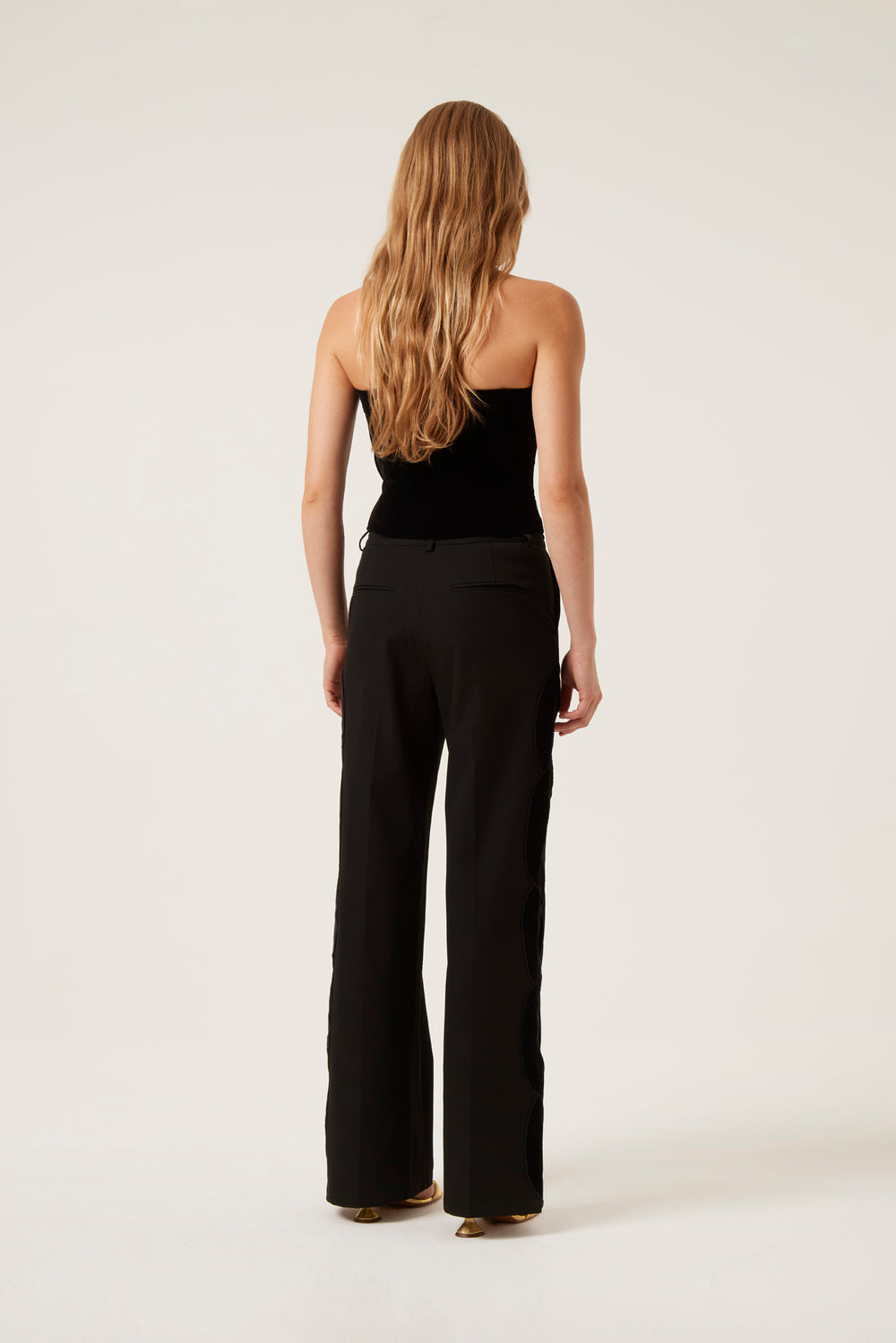 Pantalon avec ouverture tresse