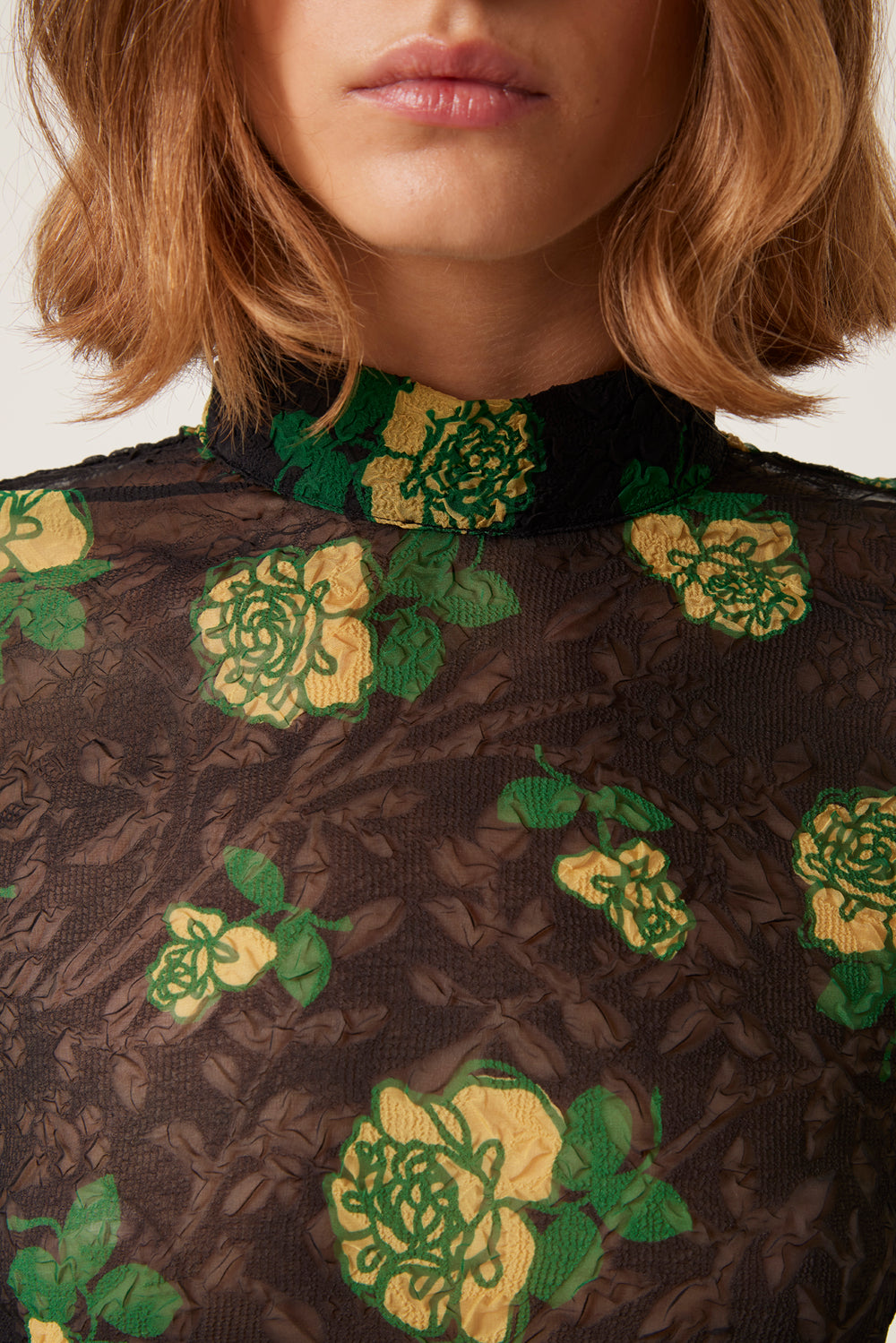 Transparent top with floral pattern