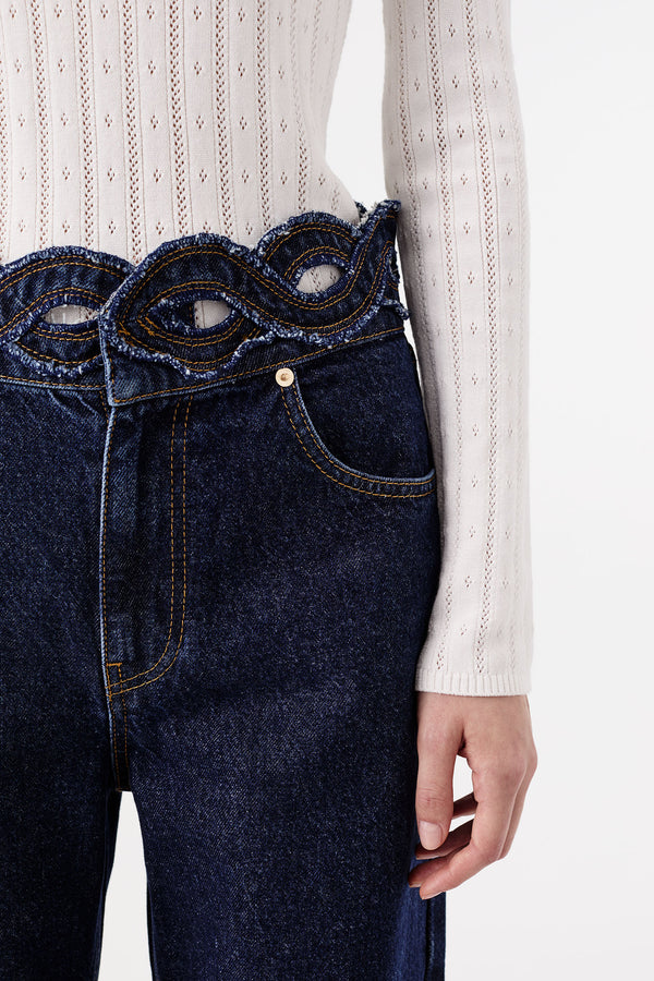 Raw denim with a braided waistband