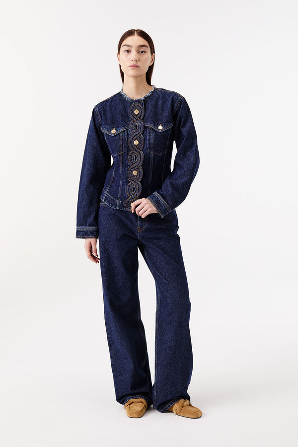 Denim jacket with braided buttonholes